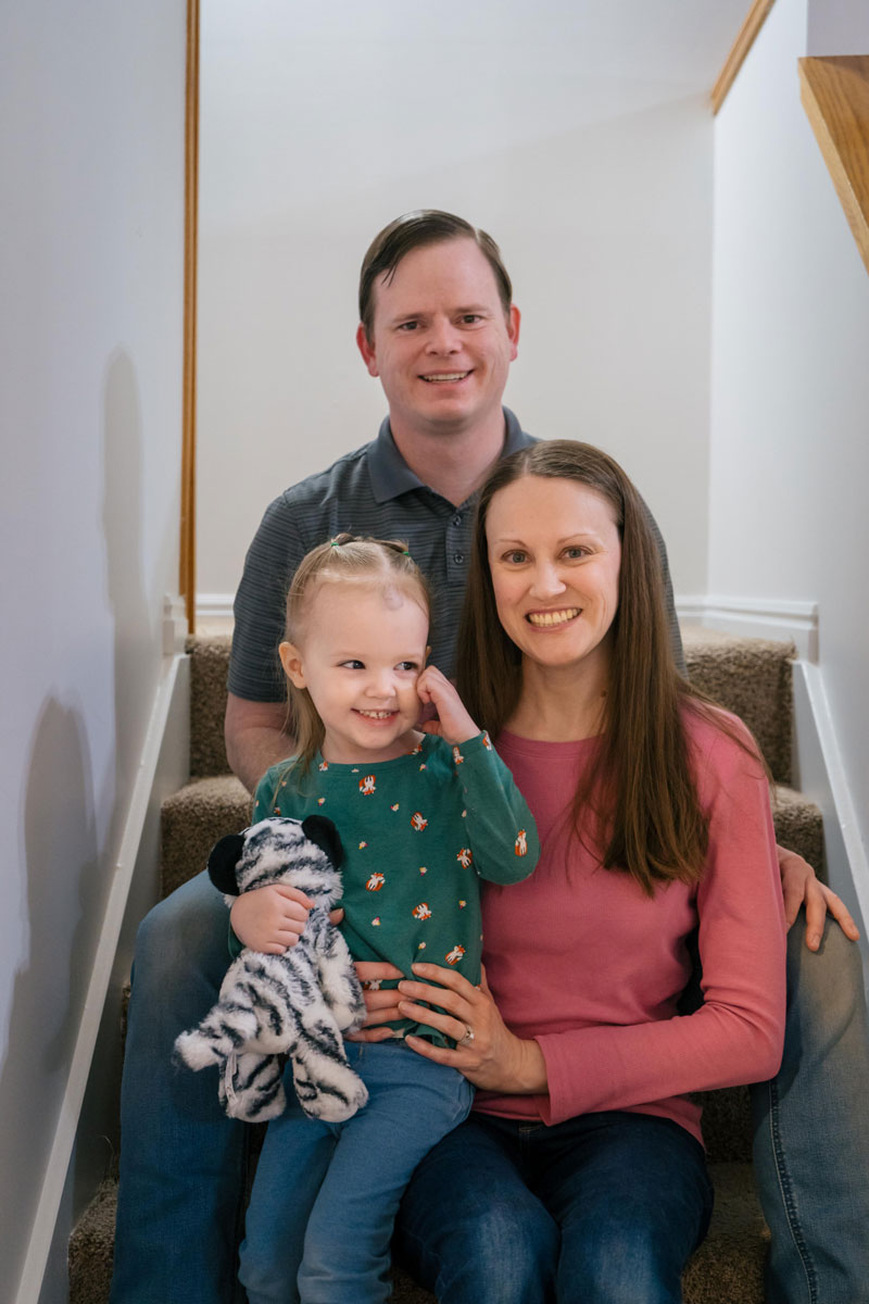 The Jones family pose on some stairs