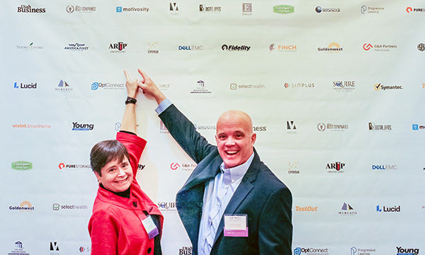 ARUP CEO Sherrie Perkins and President Andy Theurer indicate ARUP in a list of award winner