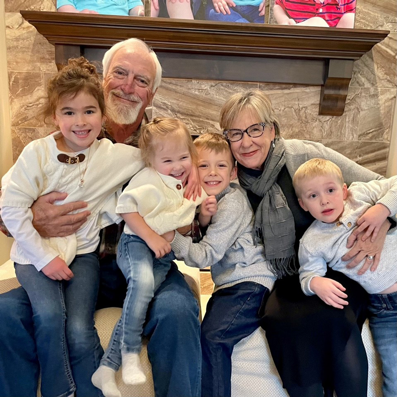 Grandparents with their young grandchildren