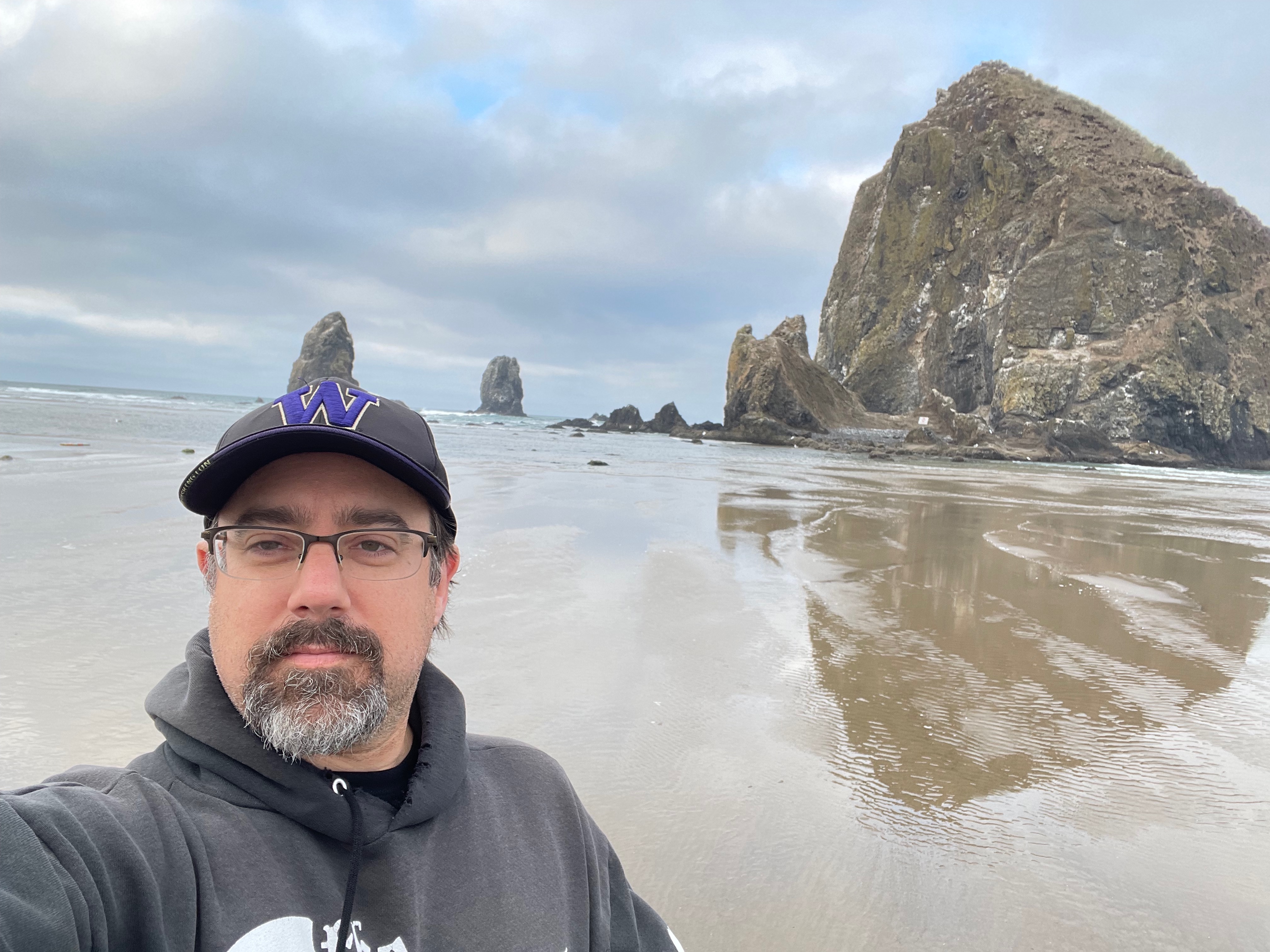 Eric Konnick on a beach in cold weather